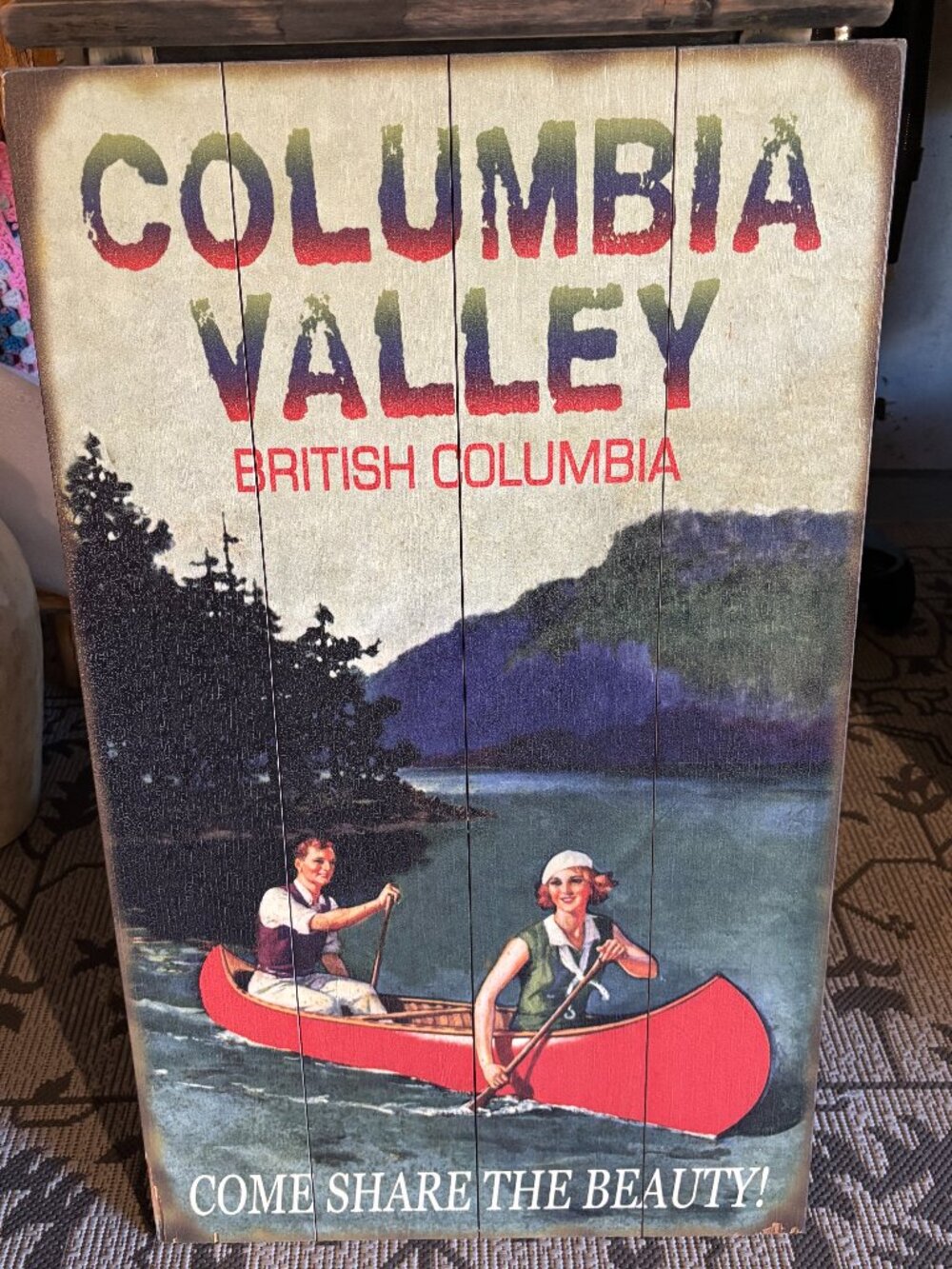 Vintage Style Wooden Picture Depicting a Couple Canoeing in The Columbia Valley